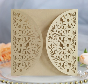 Champagne gold laser-cut floral wedding invitation cover on pearl paper