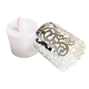 Silver laser-cut tea light candle wrap with vine pattern for LED votive decoration