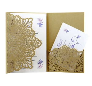 Detailed laser-cut ivory invitation card with floral mandala pattern and printed inner inserts