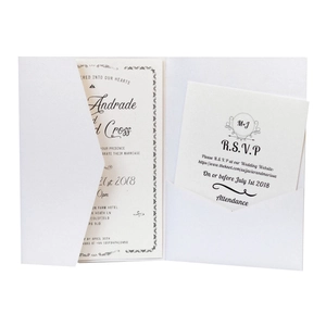 Elegant white laser-cut wedding invitation set with main card and RSVP card insert
