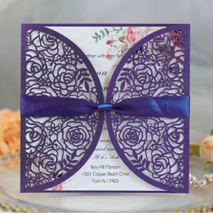Purple laser cut rose wedding invitation with a navy blue ribbon and floral inner card