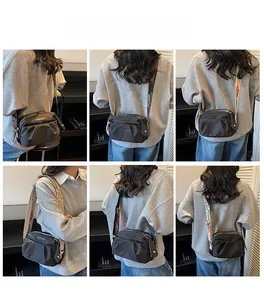 Multi-angle shots of a black pleated nylon crossbody bag with floral strap on a model
