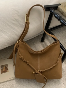 Caramel matte leather hobo bag with rope woven trim and vintage gold hardware