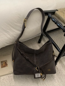 Retro dark brown large capacity bucket bag with white stitching and woven rope detail