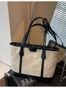 Minimalistische beige Tragetasche mit schwarzen Ledergriffen und Besatz für Damen