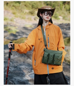 Outdoor tactical crossbody bag in army green nylon with multiple functional pockets