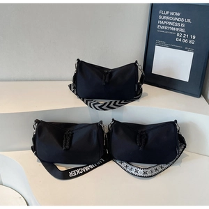 Detailed comparison of black canvas pillow bags with three distinct stylish strap designs