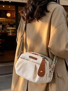 Chic beige ruched canvas crossbody bag with bohemian embroidered wide strap for women
