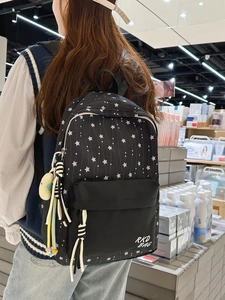 Japanese style black star pattern school backpack with cute doll and tassels