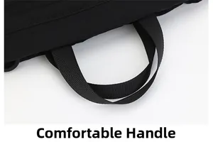 Close-up of the comfortable nylon webbing handle with reinforced stitching for durability