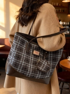 Chic plaid tote bag with brown leather trim and matching mini pouch for women