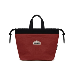 Detail of waterproof nylon tote with YINGZHINUO logo and drawstring closure