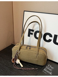 Olive green suede rectangular shoulder bag with creative baseball charm and twin straps