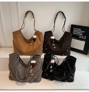 Détails de sacs cabas vintage en gingembre, café, gris et noir avec une texture douce