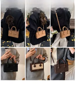 Detailed views of vintage square handbag showing crossbody, shoulder and hand-carry styles