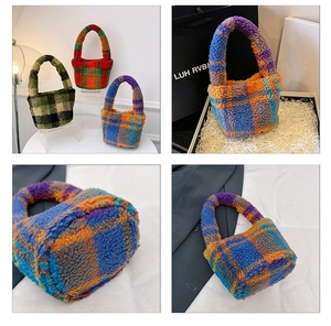 Detail of the high-quality plush lamb wool texture and plaid pattern on the bucket bag