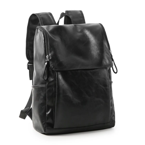 Detail view of large capacity black leather backpack with side pockets and zipper closure