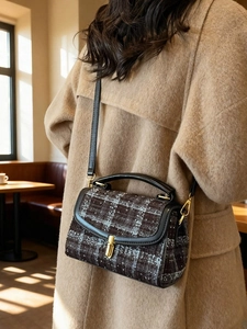 Vintage plaid tweed crossbody bag with gold hardware shown in a cozy cafe setting