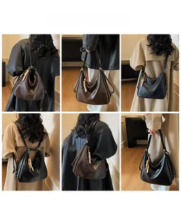 Detailed views of vintage large capacity faux leather tote bag in black and dark brown