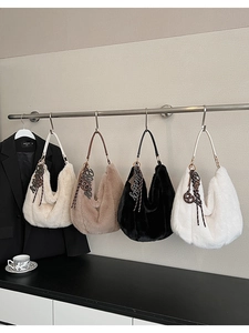 Plush hobo bags in cream, brown, and black colors with metallic Honey charms and woven tags