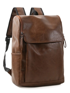 Vintage brown leather backpack with large capacity and buckle closure on white background