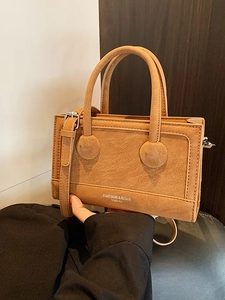 Classic camel faux leather mini handbag with top handles and adjustable shoulder strap