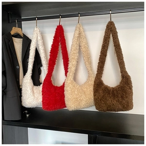 Detail showing plush shoulder bags in white red beige and brown faux fur texture