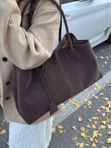 Large dark coffee suede tote bag for women showing a minimalist commute shoulder bag design