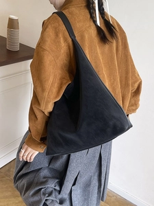 Minimalist black matte leather hobo bag with large capacity and wide shoulder strap