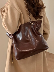 Vintage large dark brown tote bag with glossy leather and gold chain strap