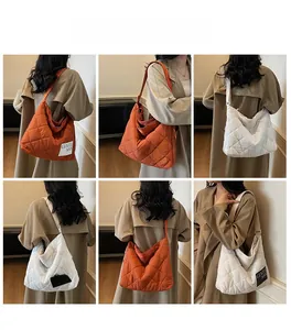 Detail shots of large quilted tote bags in orange and white with textile texture
