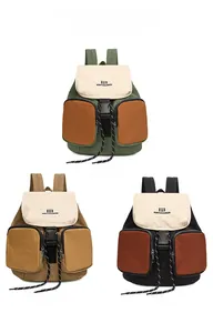 Close-up of three hiking backpacks in dark green, warm khaki brown, and obsidian black colors