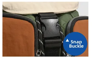 Detail of color-block nylon backpack with black quick-release buckle and metal zipper