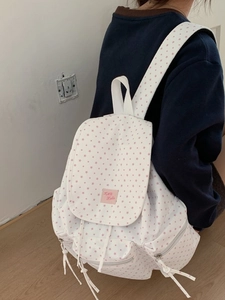 Large capacity canvas backpack for women featuring pink star patterns and flap closure