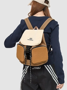 Versatile beige and tan cargo style hiking backpack with adjustable buckle flap for women