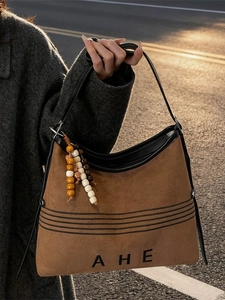 Retro brown suede tote bag with large capacity, leather straps and beaded charm detail