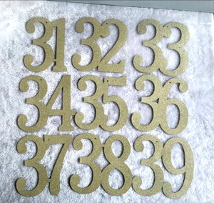 Golden glitter numbered cards 31-39 with hanging holes for festive events and DIY crafts