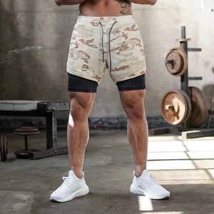 Detail of men's 2-in-1 desert camo sports shorts with black inner compression layer