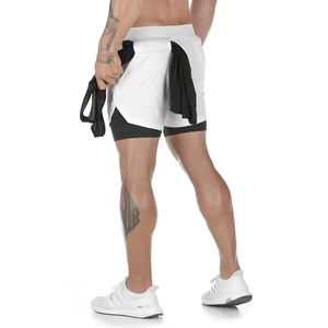 Detail of men's 2-in-1 shorts showing waist loop for gym towel and layered dry-fit fabric