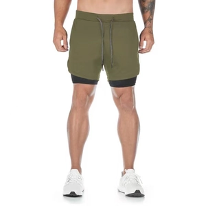 Detail of army green double-layer quick-dry shorts with drawstring and black liner