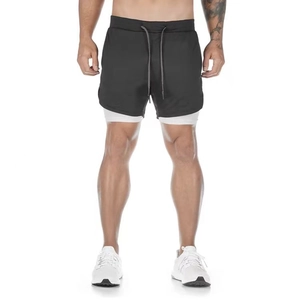 Detail of men's 2-in-1 quick-dry sports shorts with white liner and drawstring waist