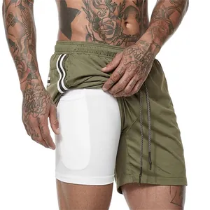 Detail of green 2-in-1 men's running shorts showing hidden phone pocket in compression liner