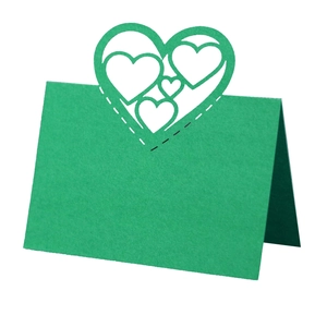 Elegant emerald green laser-cut hollow heart table card for weddings and events