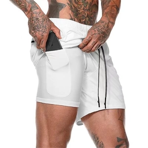Detail view of men's two-in-one running shorts showing the inner liner and phone pocket