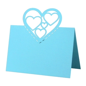Light blue 3D hollow heart-shaped table place card with laser cut floral design