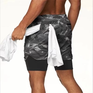 Detail of men's camouflage sports shorts featuring a functional rear towel loop holder