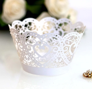 White laser-cut heart lace cupcake wrappers with elegant floral hollow patterns