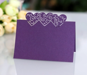 Detailed laser cut heart table place card in purple with intricate hollow patterns