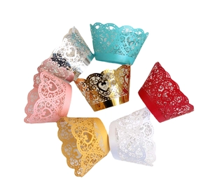 Laser cut heart lace cupcake wrappers in assorted colors for festive baking decoration