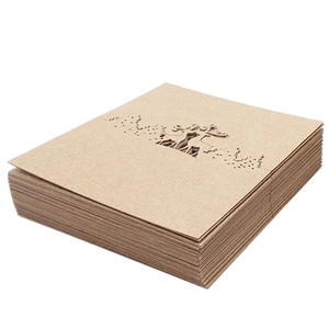Macro view of laser-cut kraft paper reindeer place cards for Christmas table settings